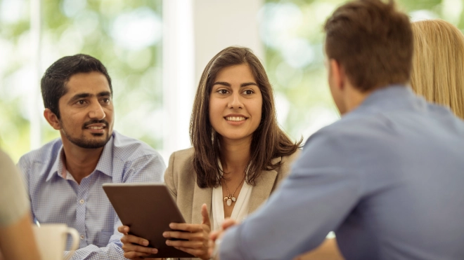 men and woman in a meeting