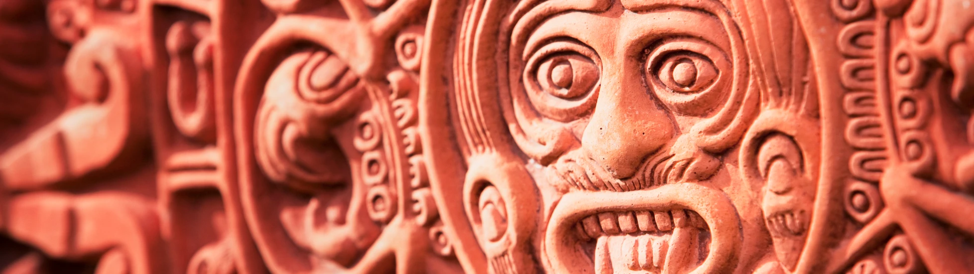 Mexican face carving in a wall