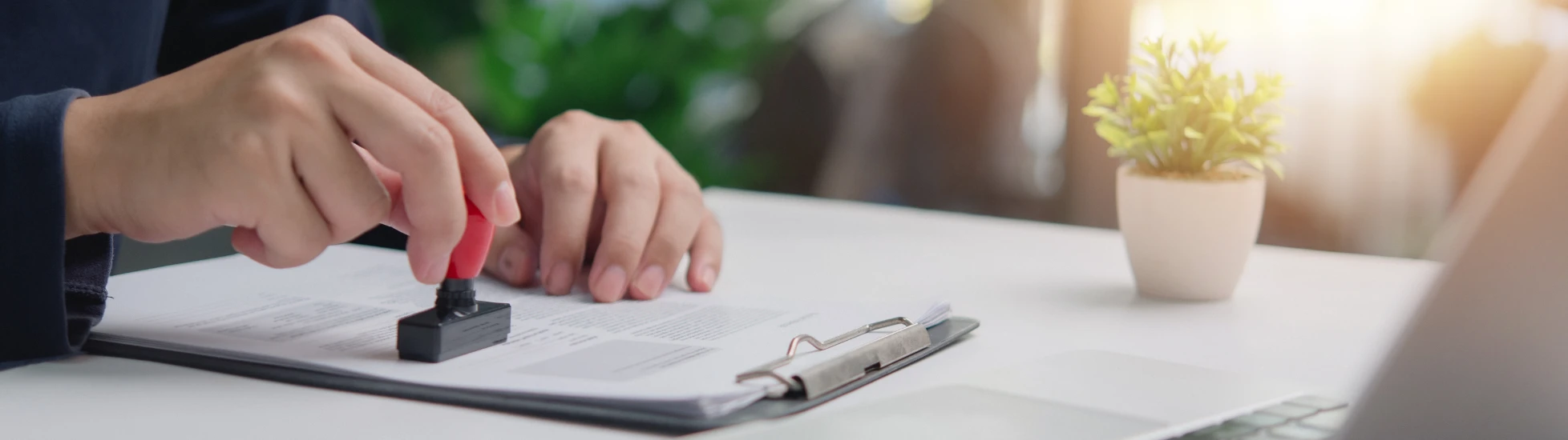 individual business person stamps document approval