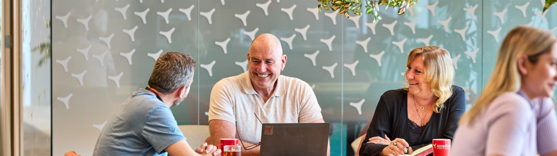 Three colleagues meeting